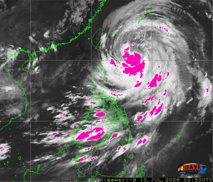 Satellite image of Philippines with weather disturbance depicting heavy rainfall in color.